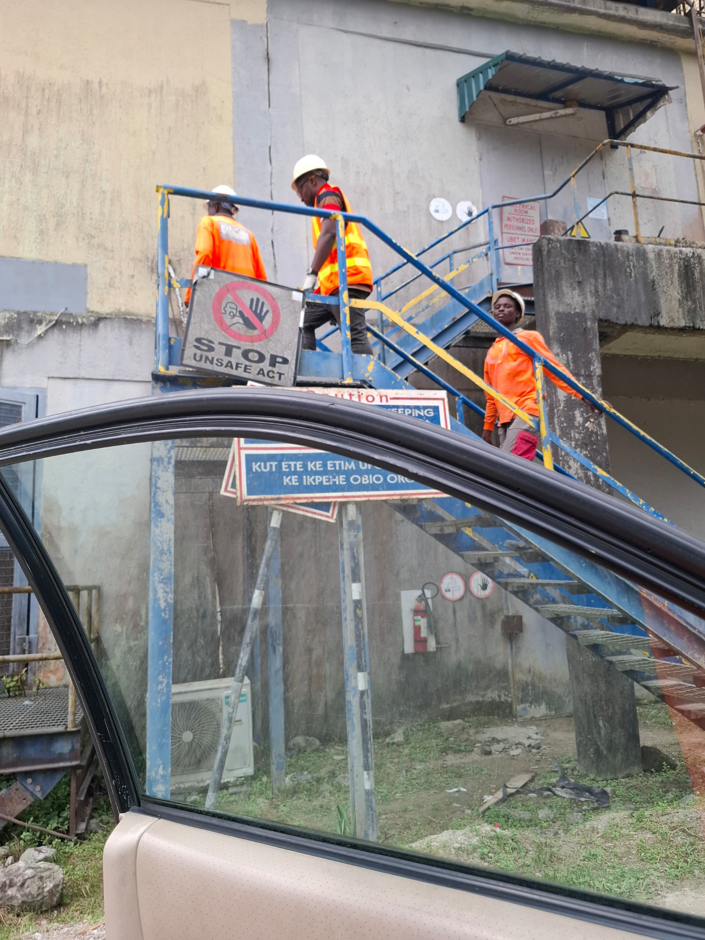 Site crew on plant access stairway